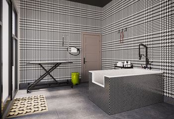 a bathroom with a white tub and a shower and a table